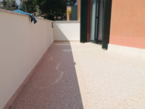 pavimenti drenanti in graniglie di marmo e resina